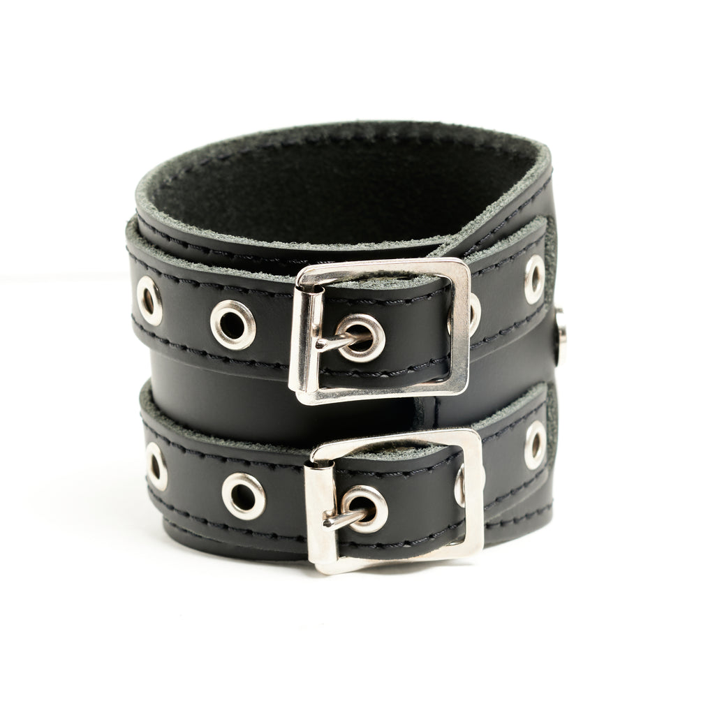 Addicted Excessories wraparound leather bracelet with black stitching and silver eyelets, gothic boutique, handcrafted in Montreal Quebec Canada
