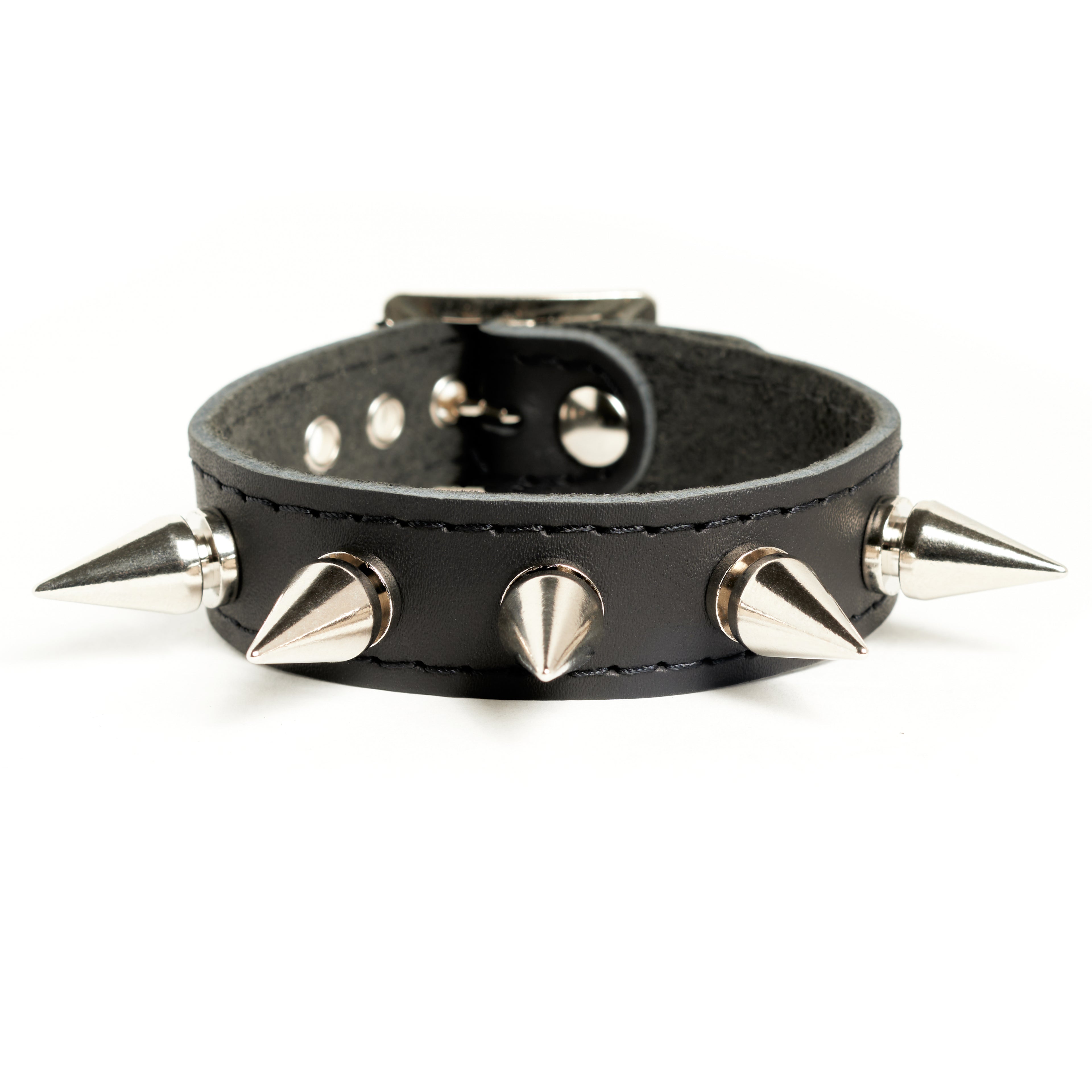 Addicted Excessories studded leather bracelet with medium spikes, gothic boutique, handcrafted in Montreal Quebec Canada
